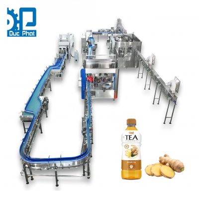 Máy chiết rót nước trà gừng đóng chai