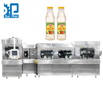 Máy chiết rót giấm táo đóng chai